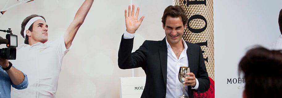 Federer waving at Moet event