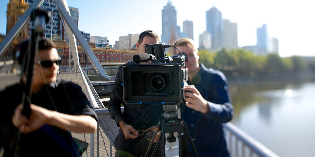 Dream Engine camera and sound crew filming beside the Yarra River in Melbourne