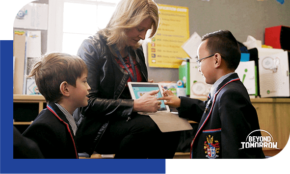 teacher showing an ipad to a student