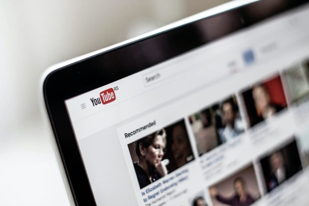 A YouTube video library displayed on a screen