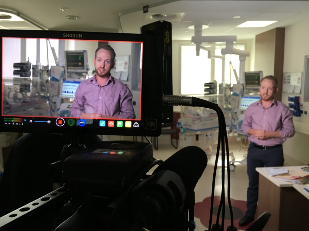 doctor speaking to camera