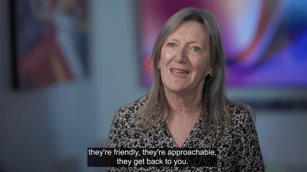 person being interviewed on camera in a law firm