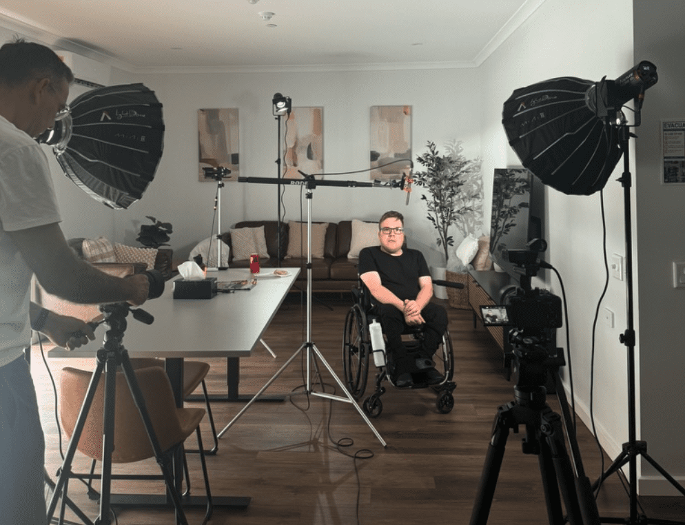 camera operator filming an NDIS video