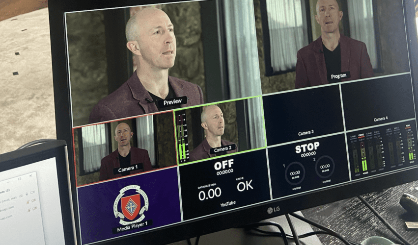 man on webinar screen