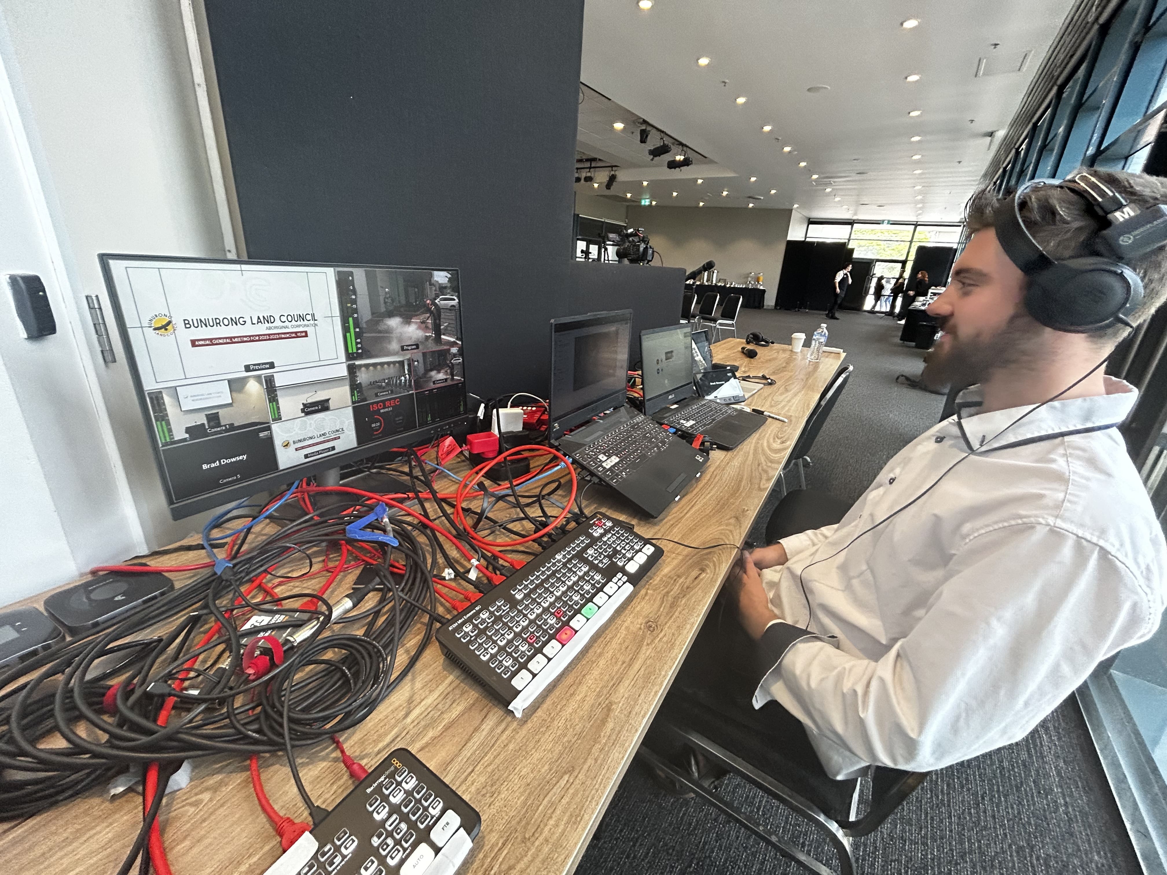 Dream Engine live production operator managing a multi-camera event production desk