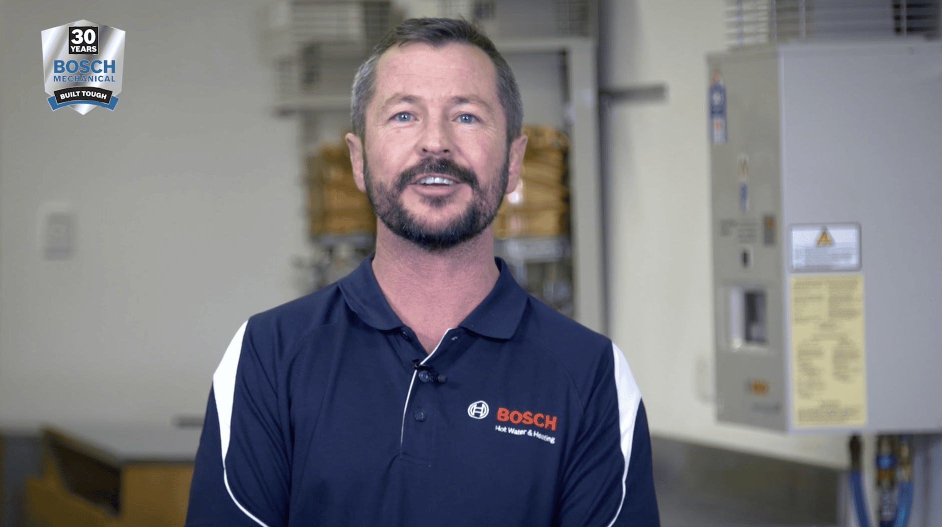 Bosch Hot Water trainer presenting a technical demonstration for a Dream Engine training video