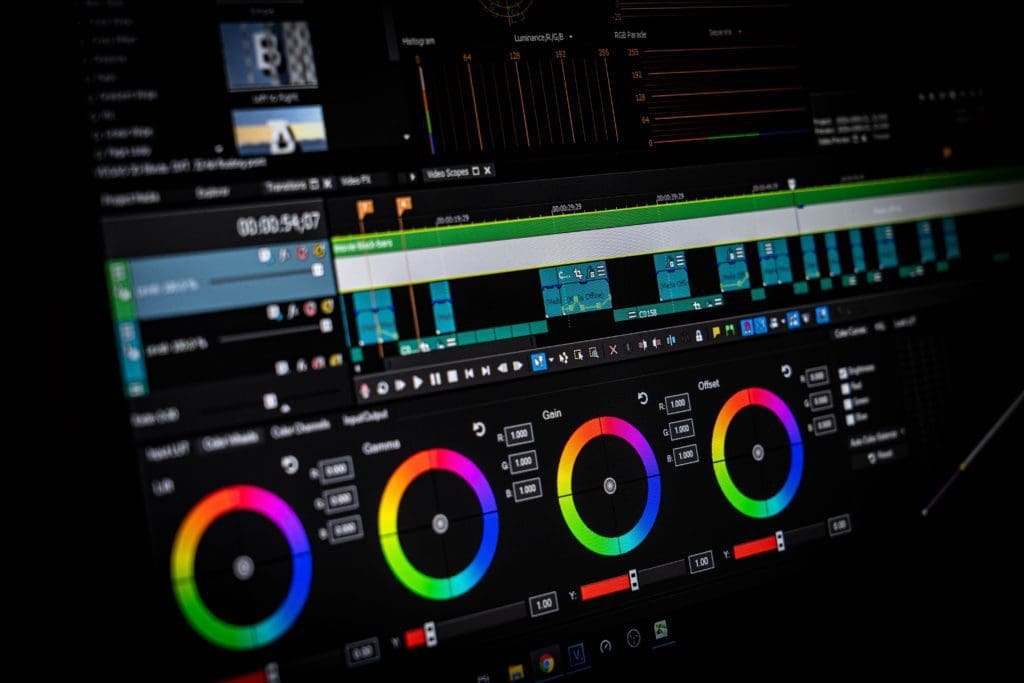 Video editing software showing a timeline and colour controls