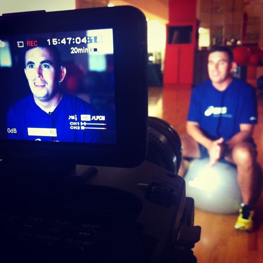 A camera monitor showing the participant seated in the interview setting.