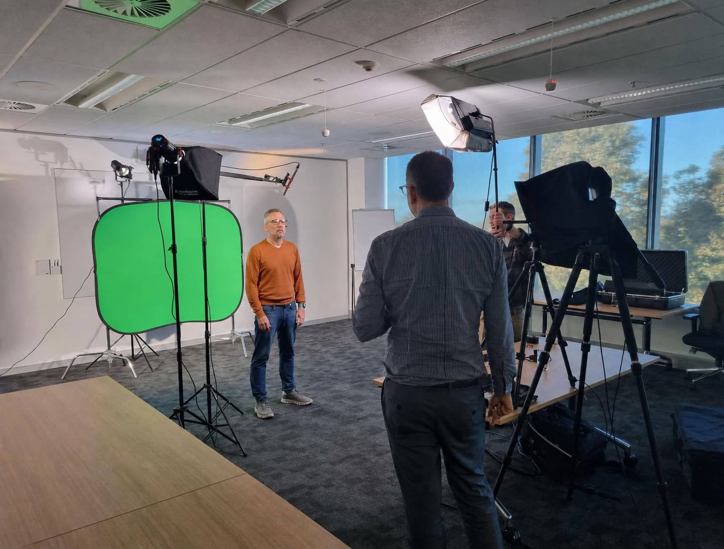 Dream Engine director guiding a presenter during a corporate video shoot in Melbourne