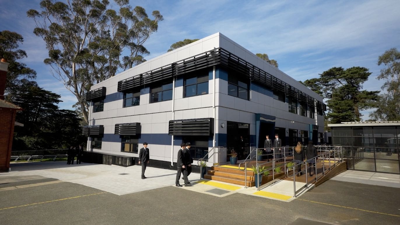 Students outside a Harwyn modular school building in Alphington