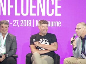 Three speakers taking part in a panel discussion at Infosys APAC Confluence in Melbourne