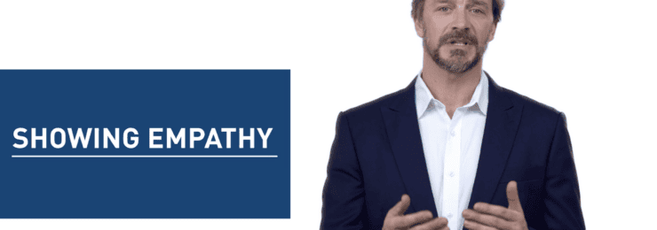 Presenter beside motion graphics text reading Showing Empathy in an OPP Victoria animated training module.