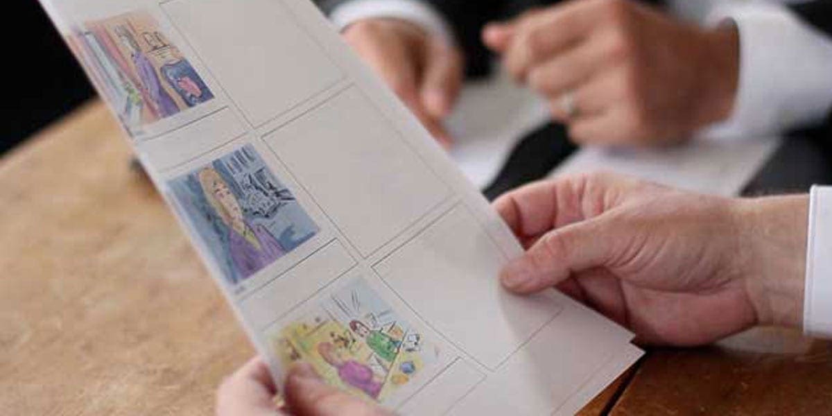 Reviewing a printed storyboard during Dream Engine pre-production