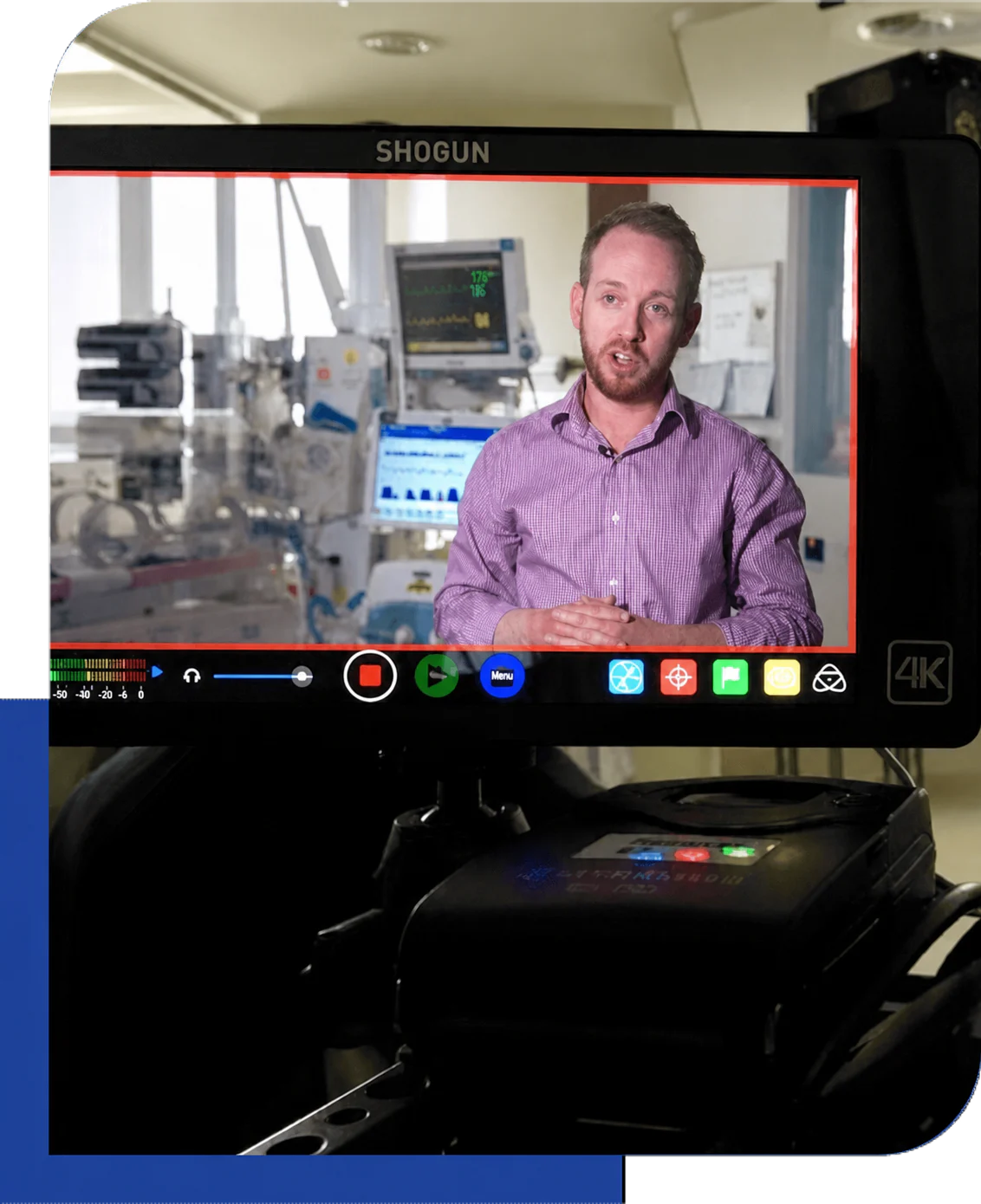 Training presenter framed on a production monitor during filming