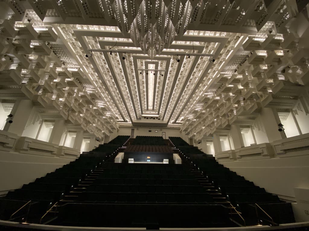 The geometric ceiling and auditorium inside Melbourne’s Capitol Theatre