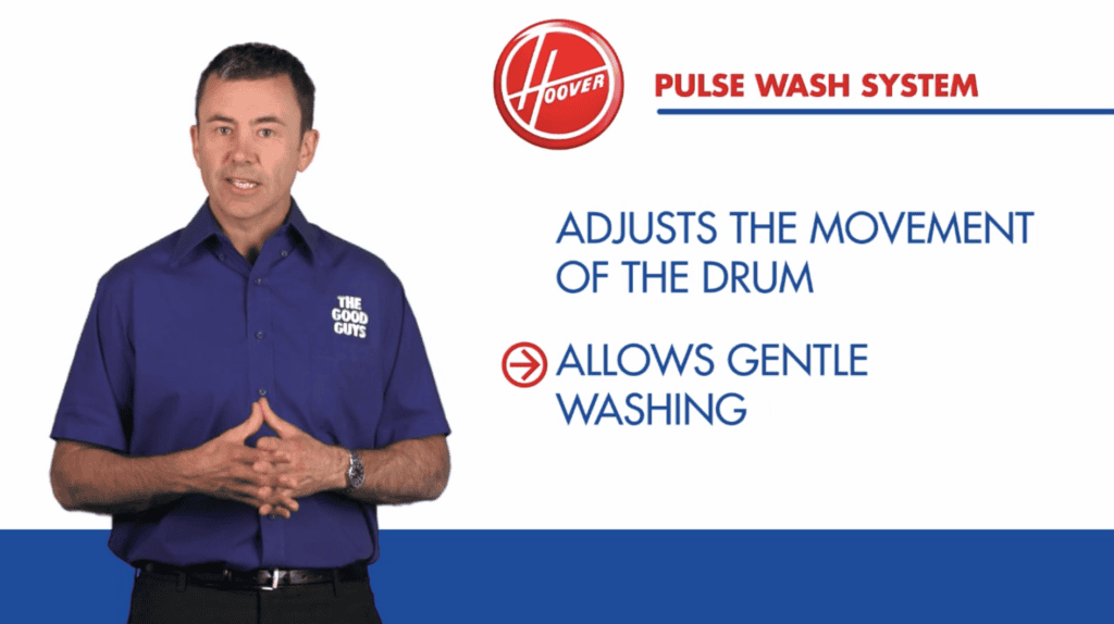A presenter in a The Good Guys shirt beside graphics explaining the Hoover Pulse Wash System.