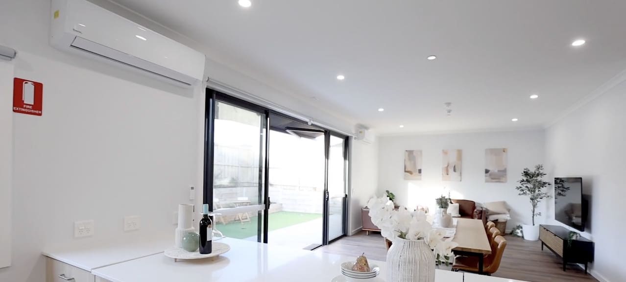 Open-plan kitchen, dining and living area shown in the InPlace Living film